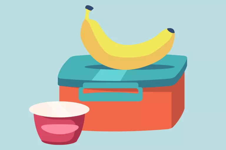 Cartoon of lunch box, a banana, and a yoghurt