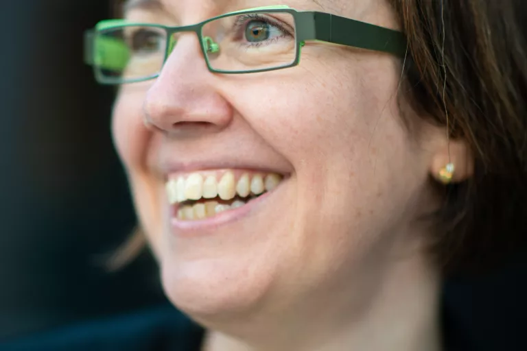 Hilde Govaert, Administrative Director at the VIB-KU Leuven Center for Brain &amp; Disease Research, smiling into the distance