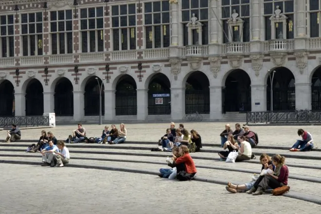Students hanging out at Ladeuzeplein, a beautiful square in central Leuven