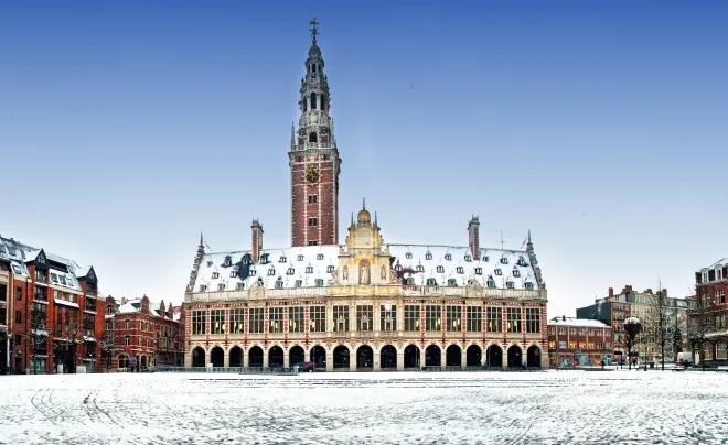 Leuven library building covered in snow